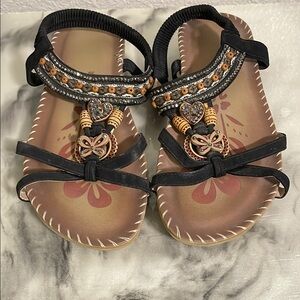 Women's Black and Tan Sandals